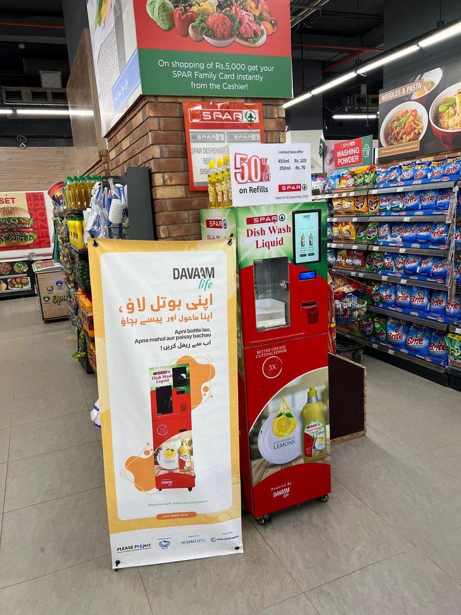 Davaam refill station in a supermarket aisle