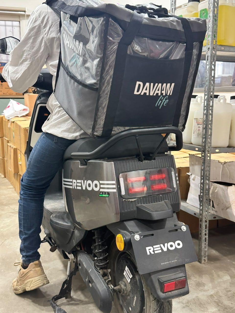 Davaam delivery rider with an insulated box